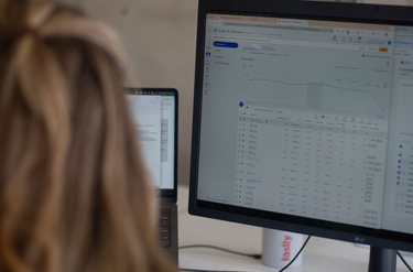 Person analyses performance data in the Google Ads dashboard for a Blackpepper client